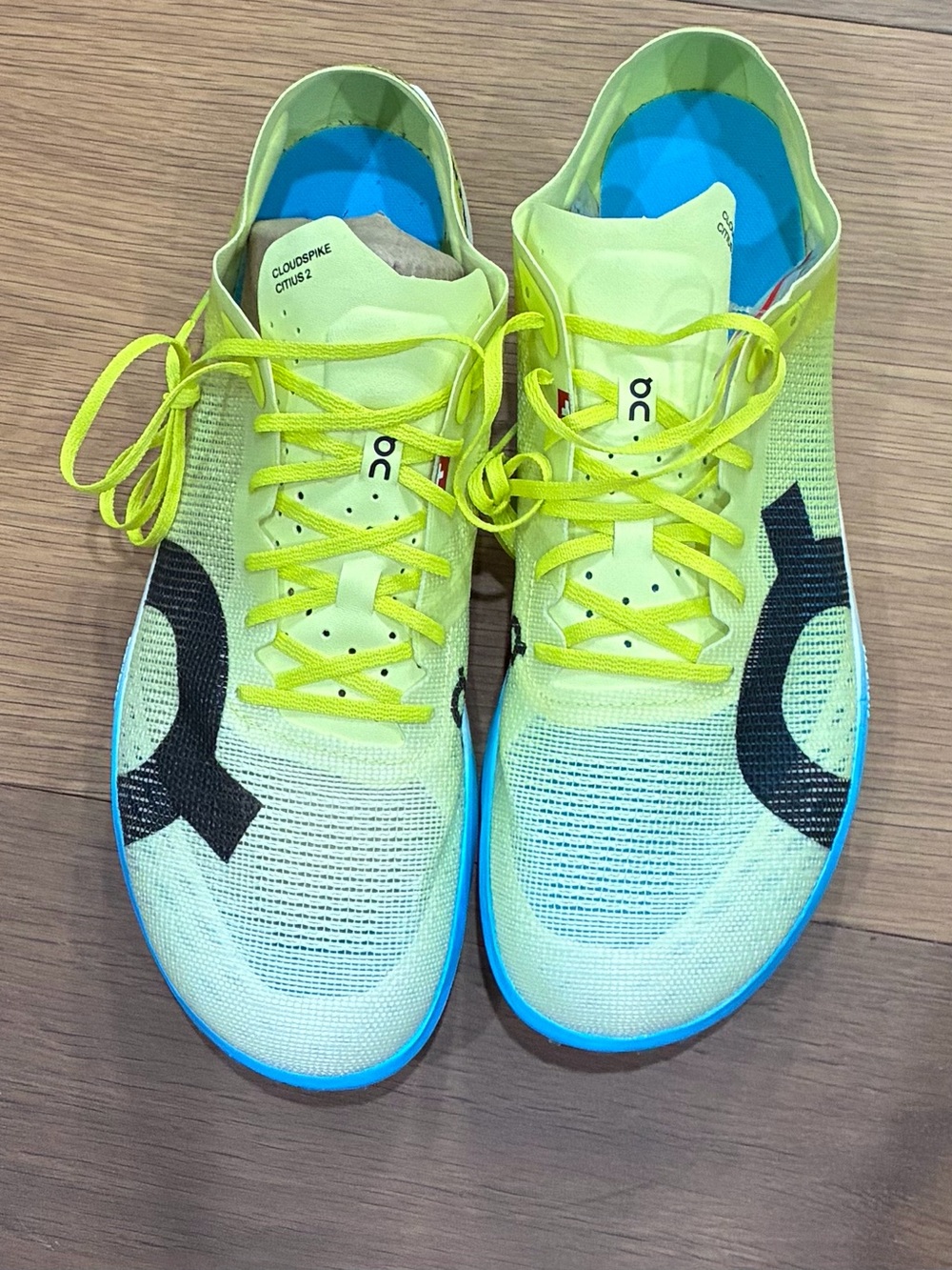 On Running Cloudspike Men’s Athletic Shoes - Neon Yellow with Blue Soles